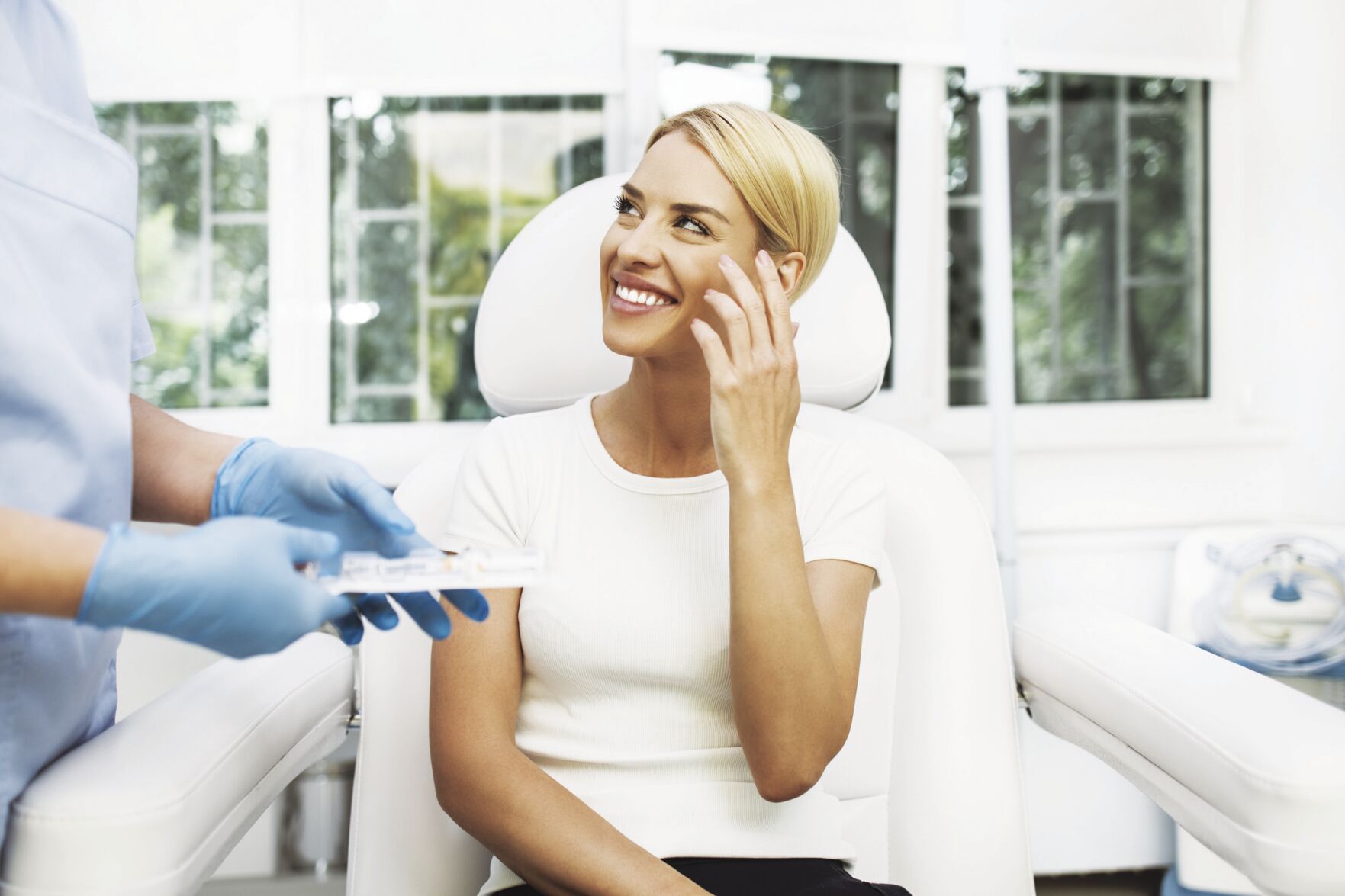 Lady smiling at doctor